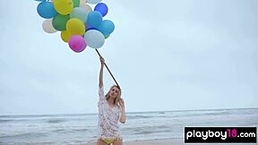 Skinny Italian MILF Plays With Balloons On Beach?