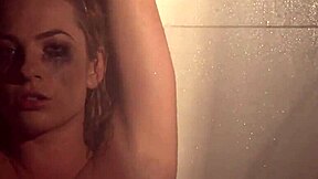Dahlia Sky enjoys naughty solo masturbation in the shower, showing tits and ass.