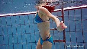 Martina shows off her blue bikini underwater