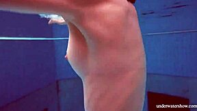 Martina shows off her blue bikini underwater