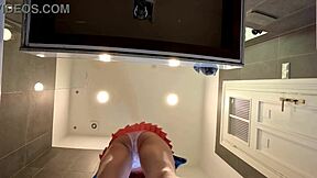 why is this braless brunette showing her ass in the bathroom?