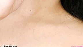 Asian teen model shows her body in photoshoot.