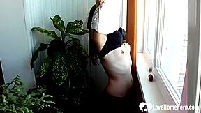 Brunette with small 18+ tits kneels for vibrator play—what’s her secret?