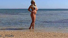 young german mom flashes extreme bikini at beach