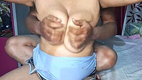 This sexy young bhabhi is enjoying an oil massage on her big natural tits.