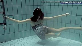 Bright tits flashing underwater turns everyone on