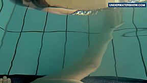 Bright tits flashing underwater turns everyone on