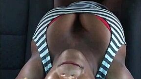 In this homemade scene, a young ebony girl with big tits does a striptease before some hardcore car sex