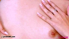 The tall brunette model passionately shows her sexy body on the sofa