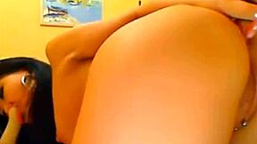 beautiful asian teen plays with dildo on webcam