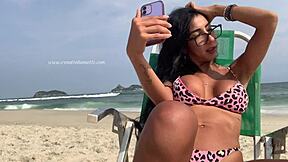 renatinha mello in a private live chat on the beach showing off