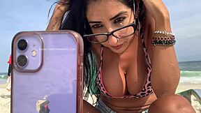 renatinha mello in a private live chat on the beach showing off