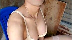 Amateur shemale nervously plays with dildo in open bathroom.