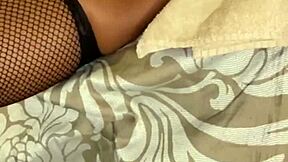 Nasty ebony nympho Barbie Charlie plays with her wet pink pussy using a dildo until she squirts.