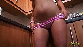 Does this blonde coed spraying cream on her tits make you want to lick her?