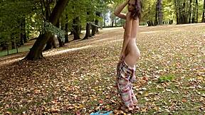 well-shaped teen 18+ is posing in the nature for fun