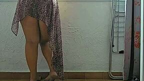 young exhibitionist flashes pussy at window for thrill