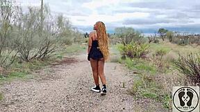 Ebony with big ass walks upskirt in sneakers.