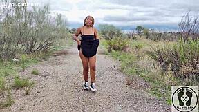 Ebony with big ass walks upskirt in sneakers.