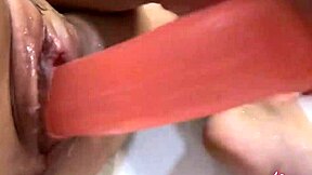 beautiful girl plays with toys in shower