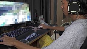 Asian babe with small waist chooses between playing game or focusing on me.