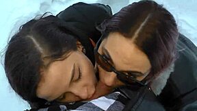 two hot girls warm a cock with blowjobs in the snow outdoors