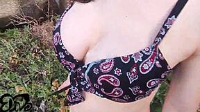 Teen gives blowjob on seaside cliff.