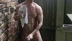 i'm showering with this sexy muscular bodybuilder, his big cock making me wet all over