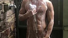 i'm showering with this sexy muscular bodybuilder, his big cock making me wet all over