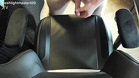 In the bedroom, the redhead teen masturbates her huge cock for a massive cum spray