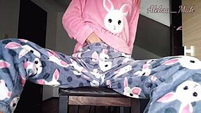 skinny teen stepdaughter teases in pajamas at home.