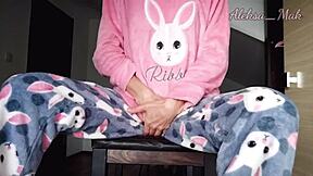 skinny teen stepdaughter teases in pajamas at home.