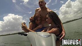 Hot threesome sucking cocks on the seadoo outdoors