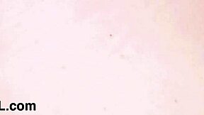 Radiant Blonde Beauty Receives Lesbian Massage on Sofa