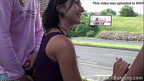 Busty girl participates in a public threesome by the highway