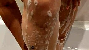 My step sister allows me to watch her shower, enjoying the voyeur attention.