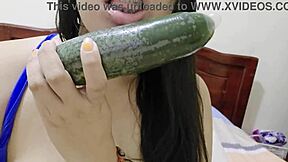 Stepmother uses cucumber on her tight pussy