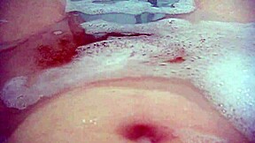 annie enjoys a comfy bubble bath with her body and monster toys