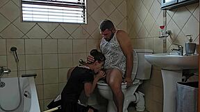 Petite Slut Sucks Cock On Toilet