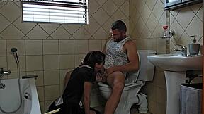 Petite Slut Sucks Cock On Toilet