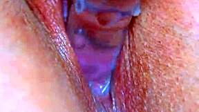 Girl's puffy pussy meets glass dildo for sensual orgasm