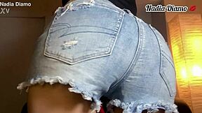 This fit body babe starts twerking and shaking her ass in mini denim shorts during solo homemade session