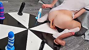 i love how my petite stepsister earns her orgasm with that wheel of dildos game