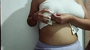 This milf indulges in massaging her big natural tits with real homemade pleasure, focusing on every sensual touch.