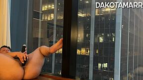 Chubby Dakota Marr squirting with butt plug and dildo in NYC skyscraper
