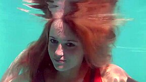 uh, redhead b nikita vodorezova strips naked real quick underwater at the beach or pool... like super fast ya know?