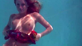 uh, redhead b nikita vodorezova strips naked real quick underwater at the beach or pool... like super fast ya know?