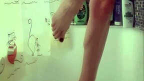 Hey, check out this busty teen 18+ washing her perfect feet in the shower