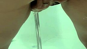 teen bent over squirting pee in bathroom