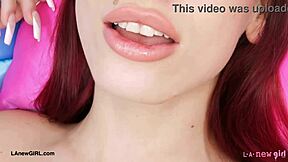 I love how this striking red-haired beauty shows off her sexy body during the photoshoot interview